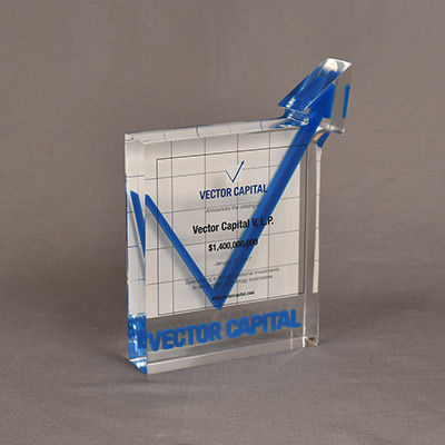 Custom cast Lucite® trophy with an arrow shape placed over a freestanding square base.